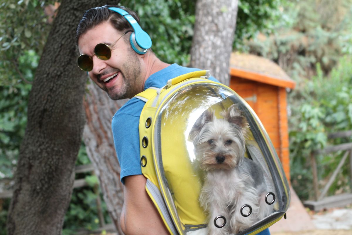 Man using fancy dog carrier